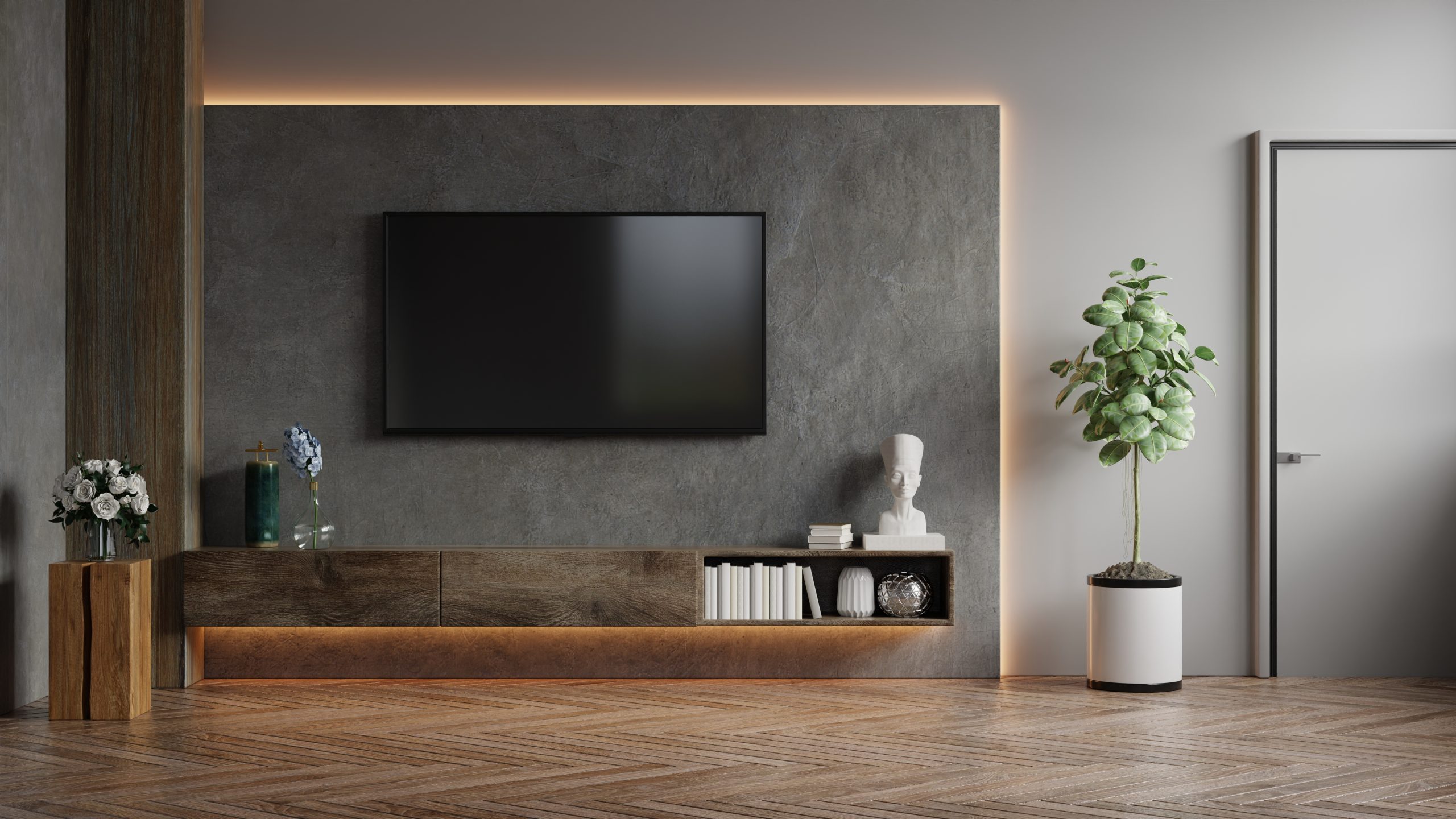 Mockup a TV wall mounted in a dark room with concrete wall.3d rendering